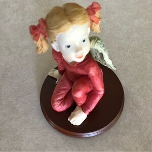 Charming Angel Figurine in Red Attire